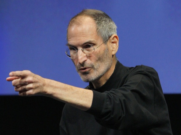 Apple Inc. CEO Steve Jobs points to a member of the audience during a Q&A session at the end of the iPhone OS4 special event at Apple headquarters in Cupertino